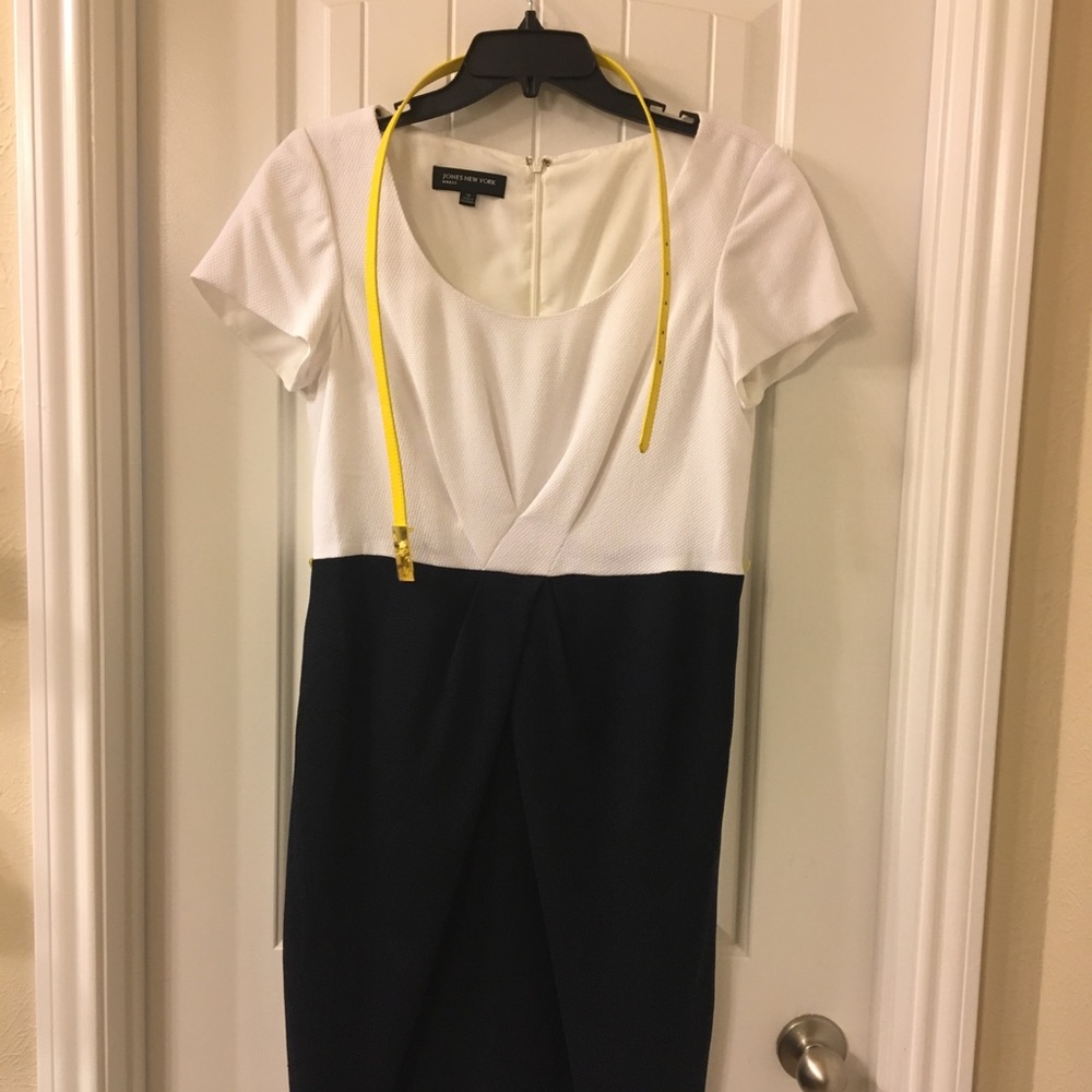 Like new; only worn once.  Zipper back, belted
